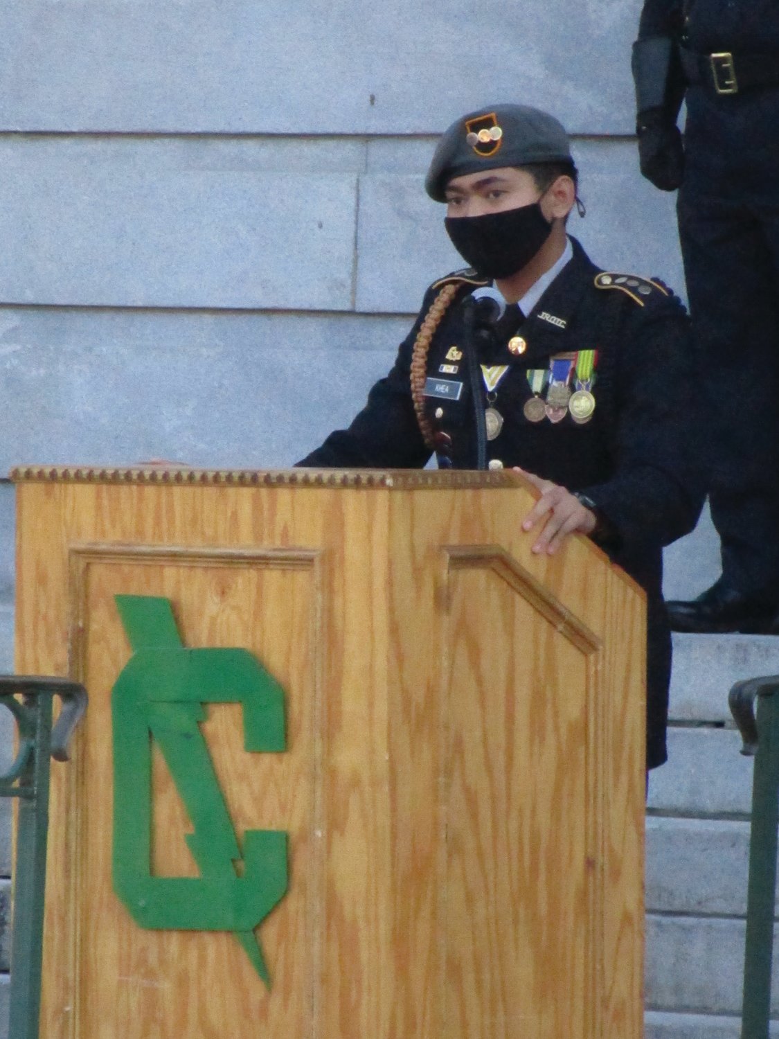 STUDENTS IN SERVICE:Cadet Lt. Col. J’ly Khea, battalion commander of the JROTC at Cranston East, addresses those on hand for Saturday’s ceremony.